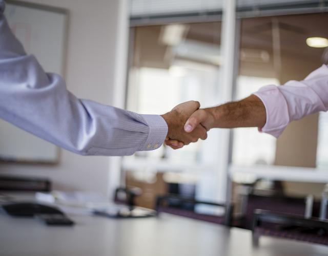 image of two hands shaking