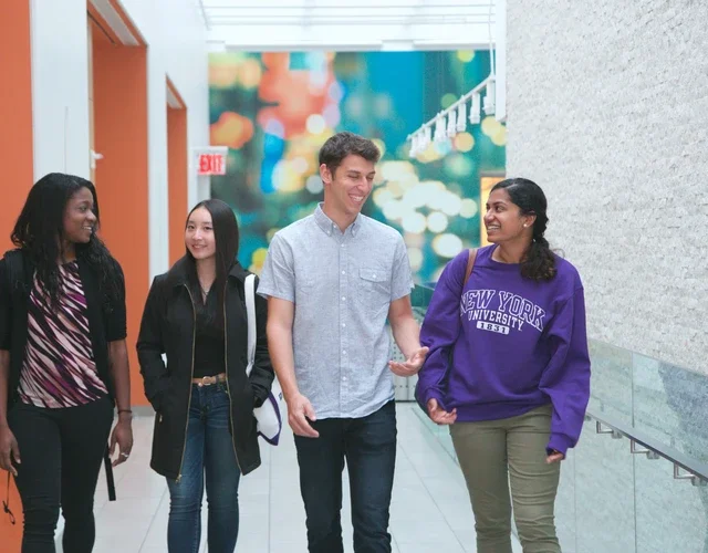 Students walking down the hall of Tisch