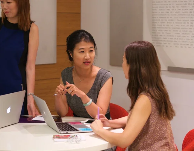 Women working together at a table