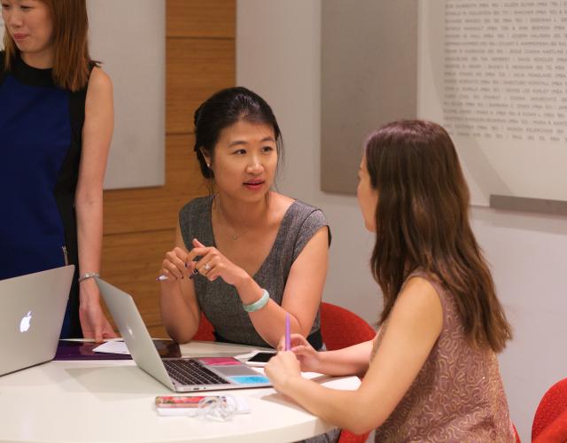 Women working together at a table