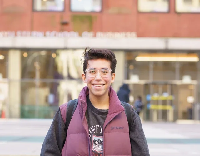 Adam in front of Tisch Hall