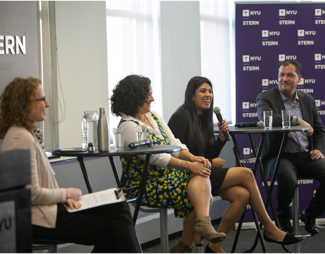 4 people during a panel discussion