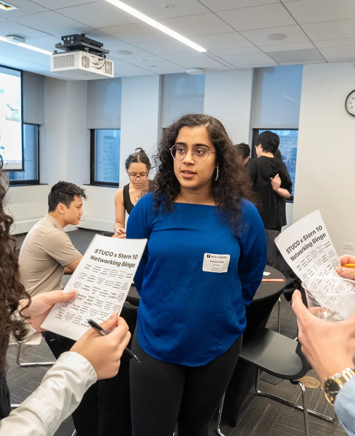 Students talk with alums at networking bingo