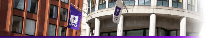 banner of NYU flags on the front of the school building