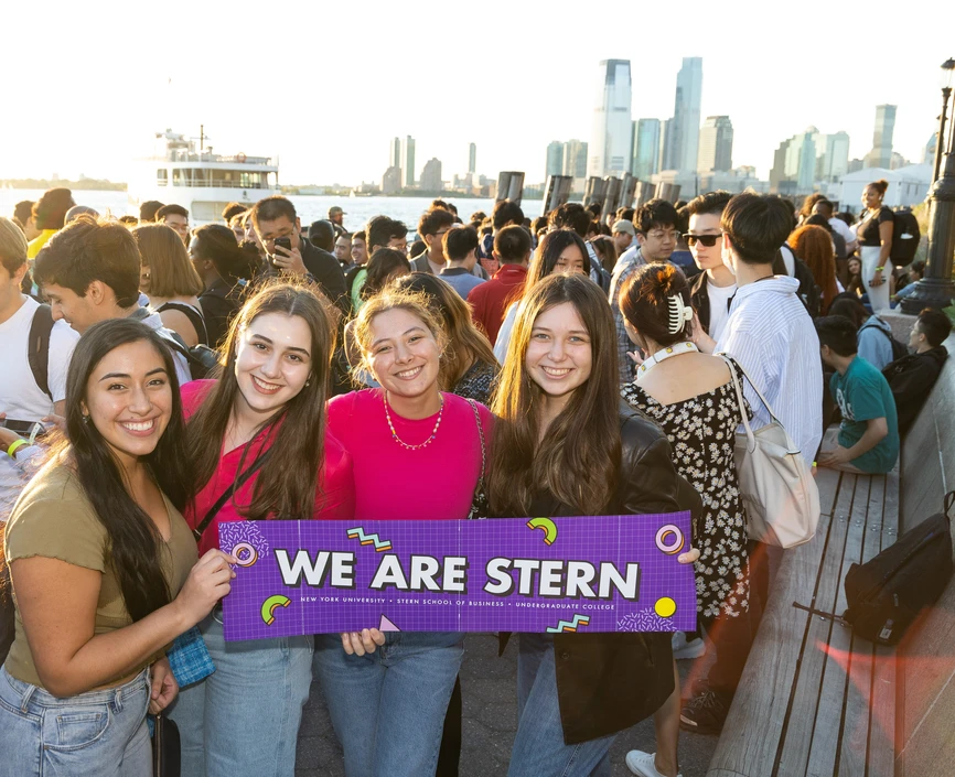 Students holding a WE ARE STERN banner