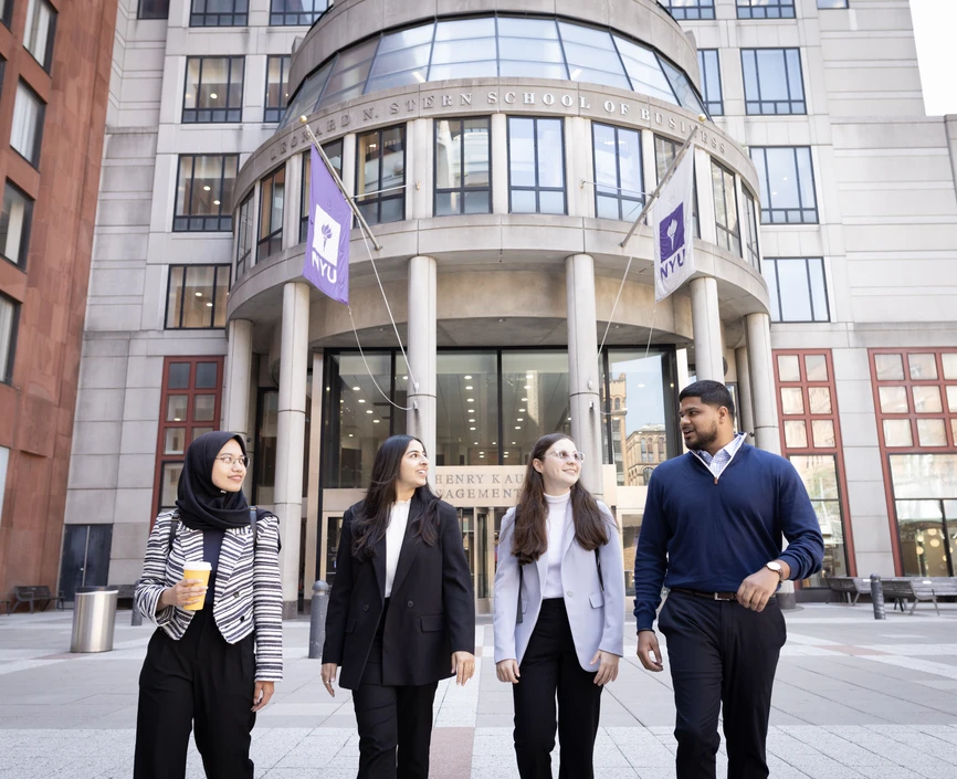 Students walk in front of Stern