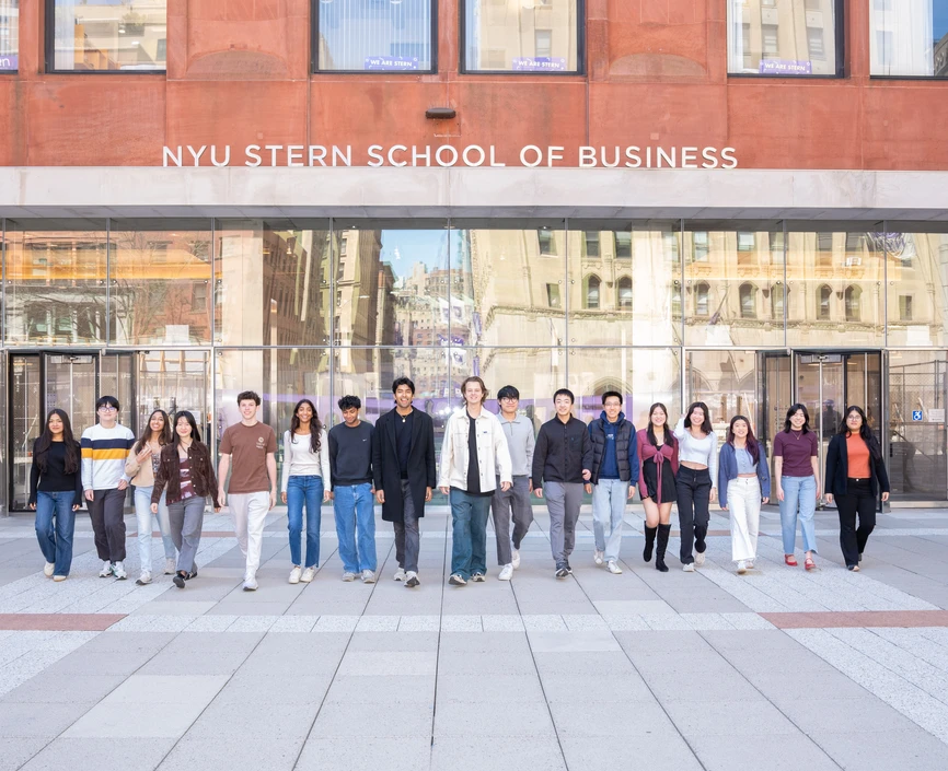 Street Team walking in front of Tisch Hall