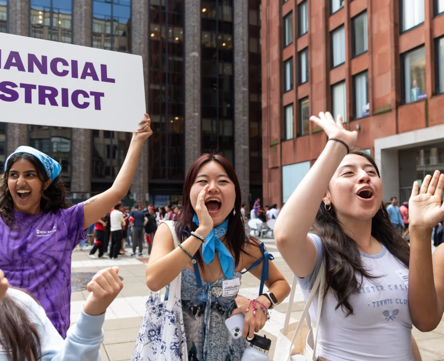 students cheering on the plaza