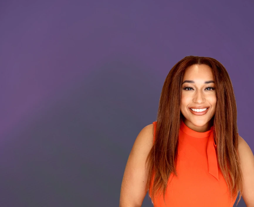 Nadia Crevecoeur headshot on a purple background