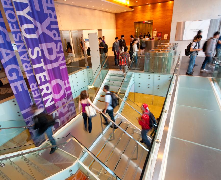 Students walking in the Tisch Lobby