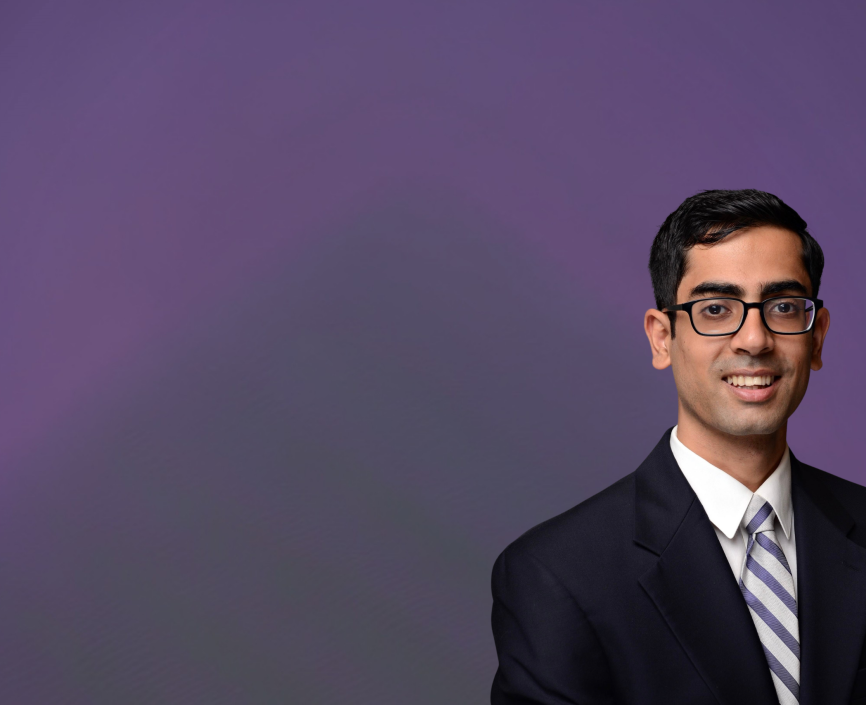 Arjun Swaminathan headshot on a purple background