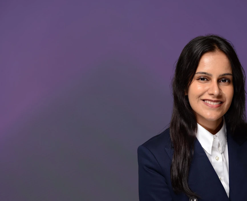 Namankita Rana headshot on a purple background