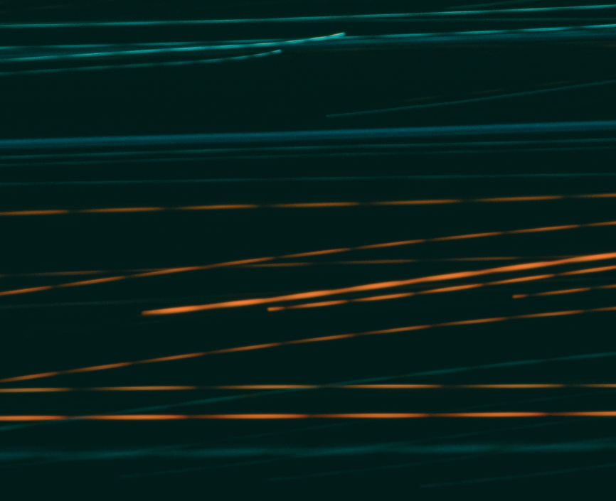 abstract green and orange light trails