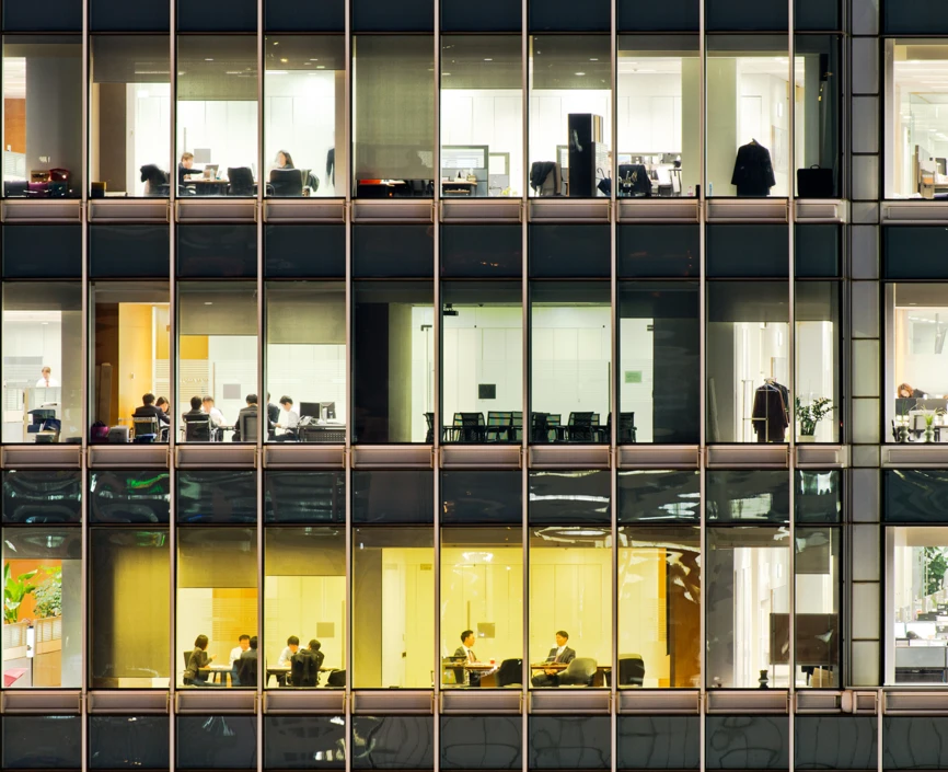 lit offices seen from a window view