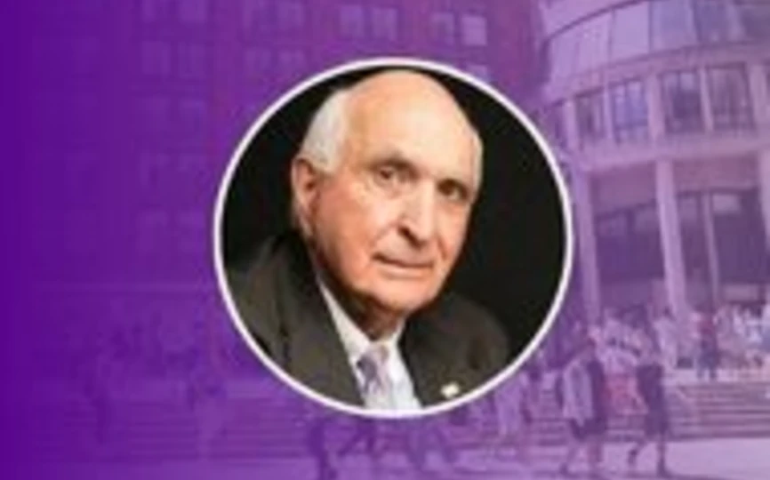 Ken Langone headshot on purple background