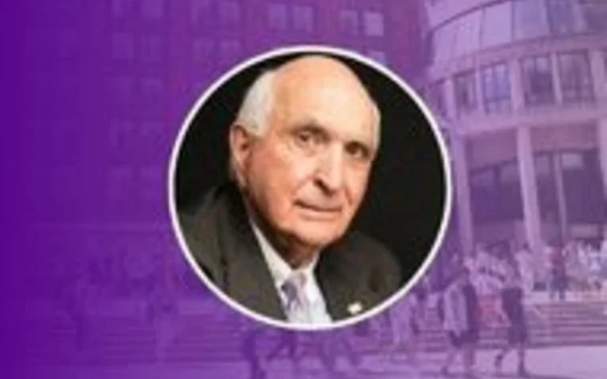 Ken Langone headshot on purple background