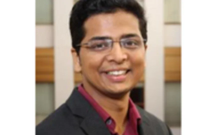 A headshot of Raveesh Mayya