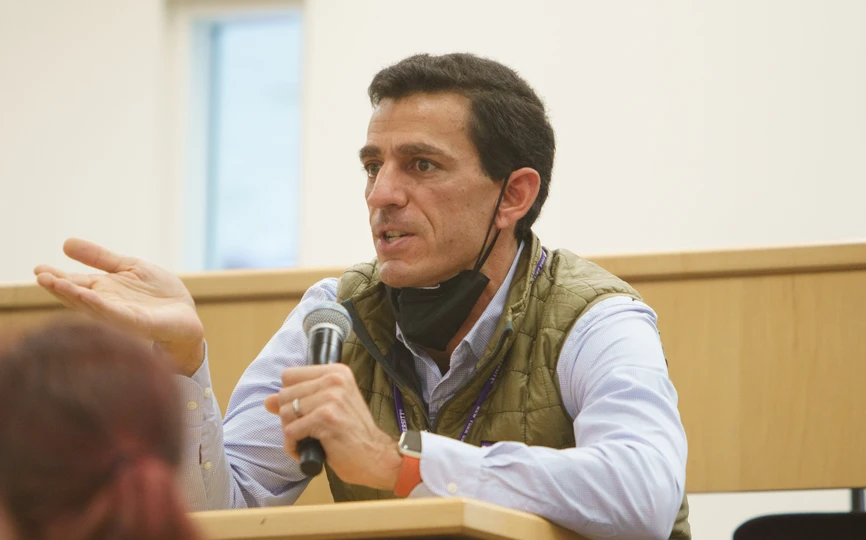 man speaking into microphone