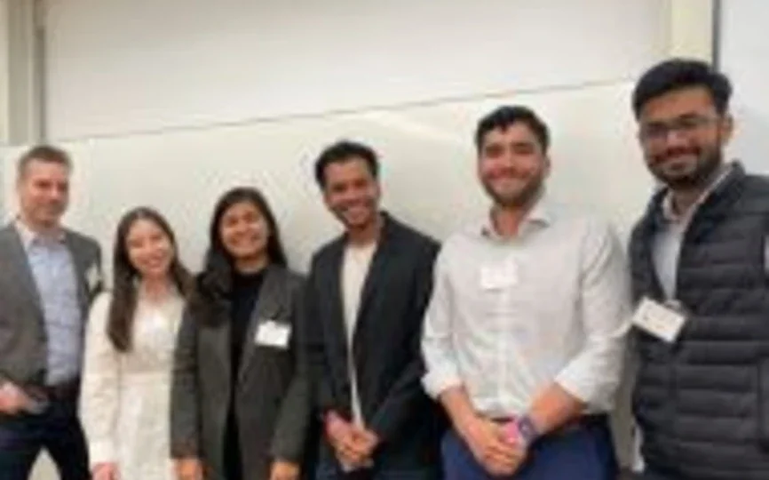 MBA students pose with Professor Michael North