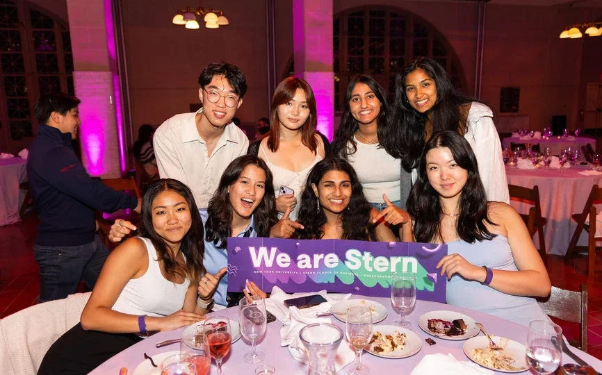 UC students holding sign that says "We are Stern"