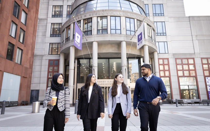 Students walk in front of Stern