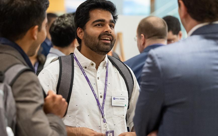 Student networking with classmates during a group interaction.