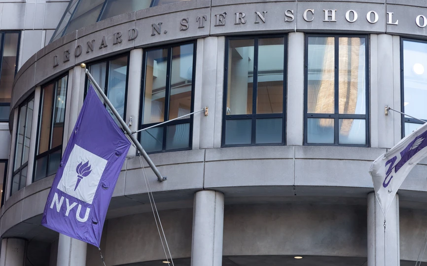 NYU flags flying in front of KMC