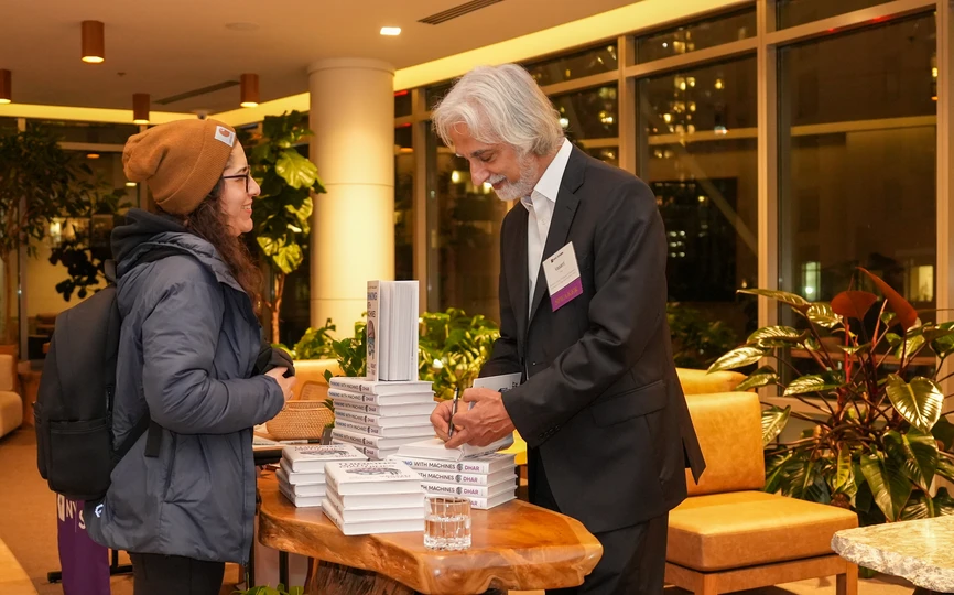 Professor Vasant Dhar with alumni in Seattle