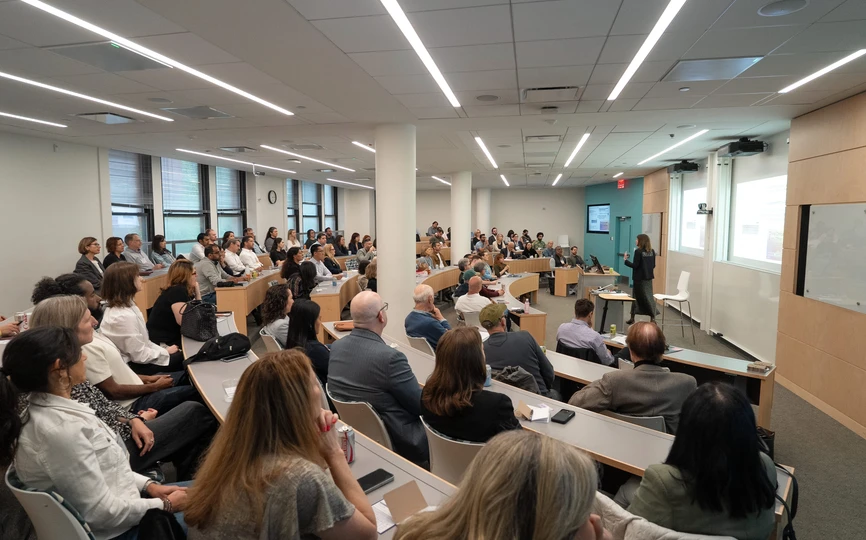 A classroom with Stern alumni