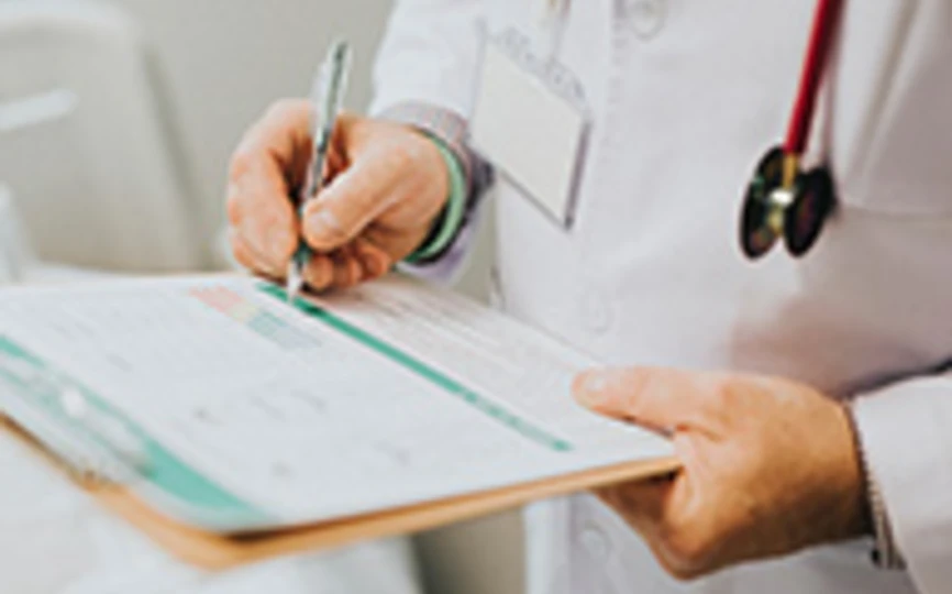 Doctor writing notes
