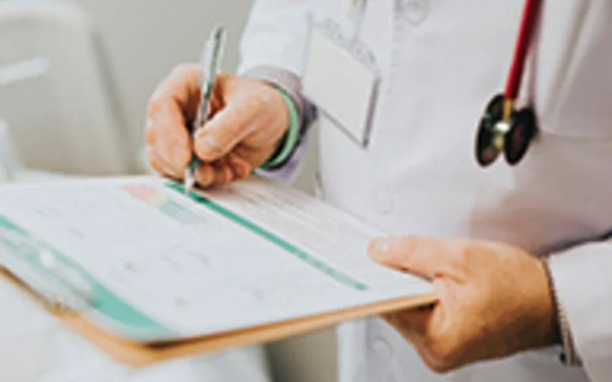 Doctor writing notes