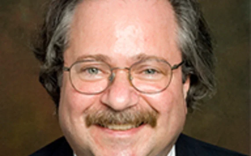 headshot of irv schenkler