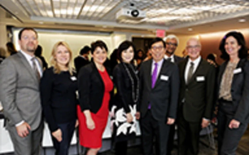 NYU Stern faculty and board members, NYU Stern Dean Raghu Sundaram and NYU President Andrew Hamilton gathered with NYU Stern alumnus Richard Ming-Hsing Tsai