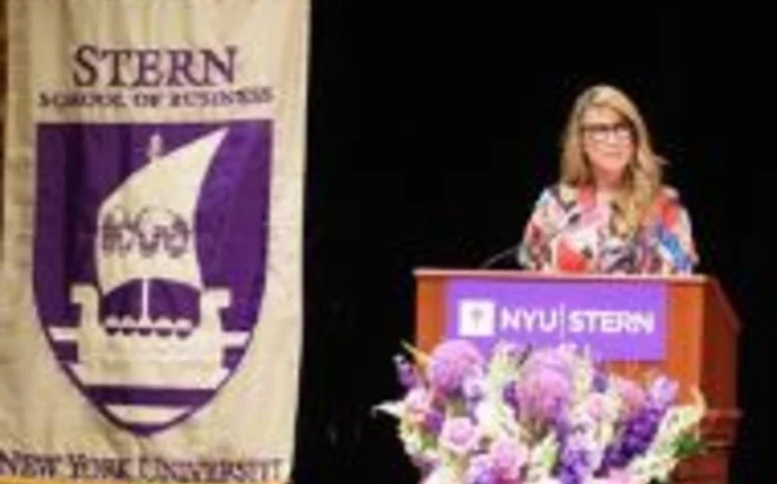 Lead Change. Alumna Jennifer Langton (MBA ‘12) addresses the Executive MBA Class of 2022 at their Graduation Celebration