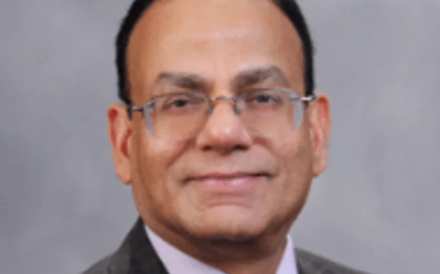 headshot of professor kose john