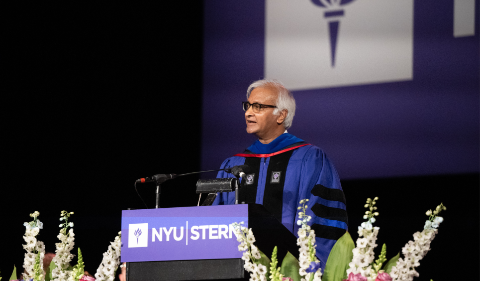 Dean Raghu Sundaram speaking at the 2024 MBA and PhD Convocation