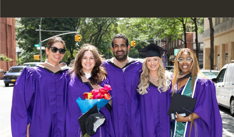 Students celebrating NYU Stern’s Executive MBA Graduation Celebration for the Class of 2026 on July 31. 
