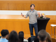 Professor Adam Alter leading an alumni workshop