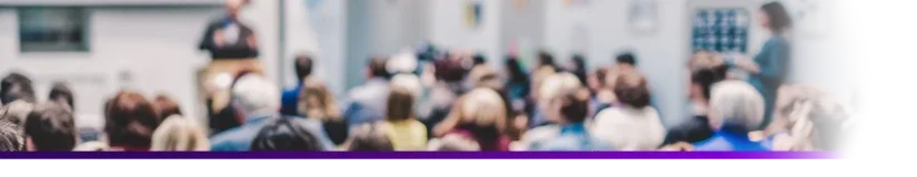 Out of focus picture of a full class during lecture