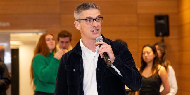 Clinical Professor Matt Statler speaks with students during the capstone’s fall semester final plenary