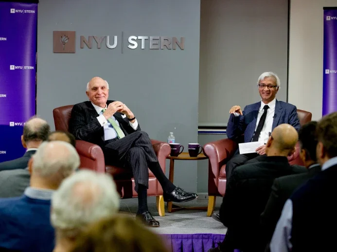 Dean Raghu Sundaram at a fireside chat with Ken Langone (MBA ’60)