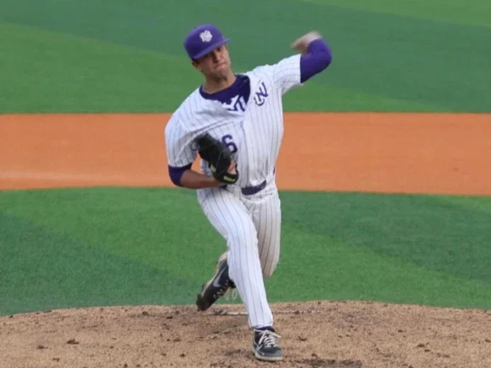 Jason Pearce (BS '25) pitching at a baseball game