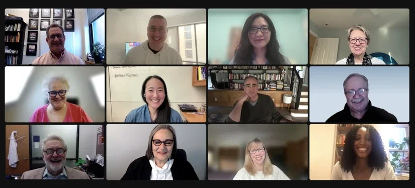 This is a photo of all 12 full-time MCOM faculty.