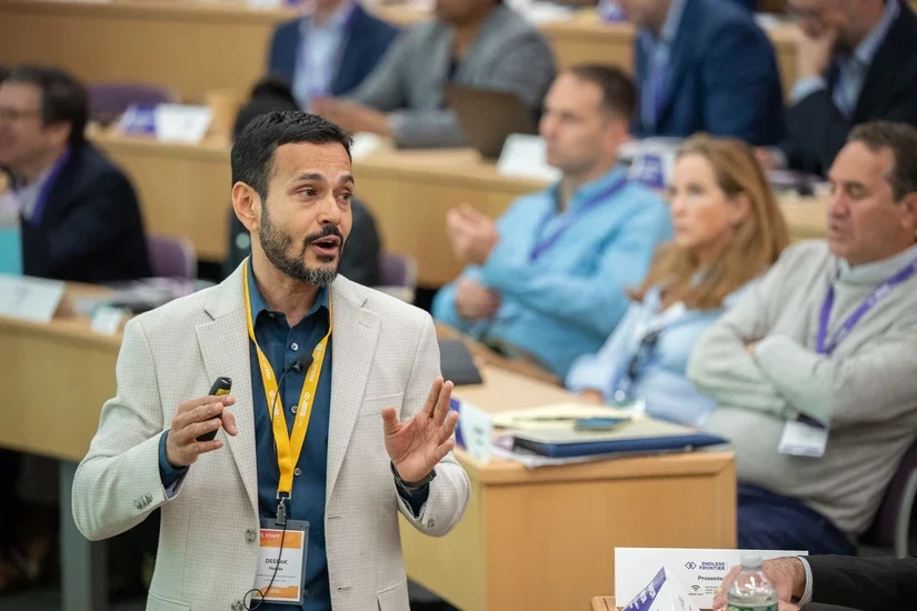 Endless Frontier Labs Founding Director Deepak Hegde speaking at the 2025 EFL showcase