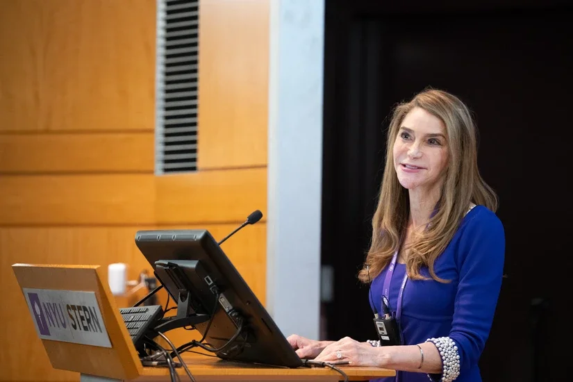 A photo of Liz Elting speaking at the 2025 EFL showcase event. 