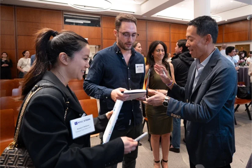 David Ko (BS ’93) signing copies of his new book for alumni