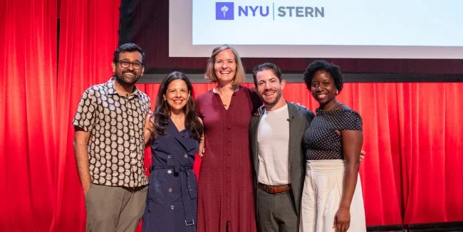 A group of five Stern alumni pose
