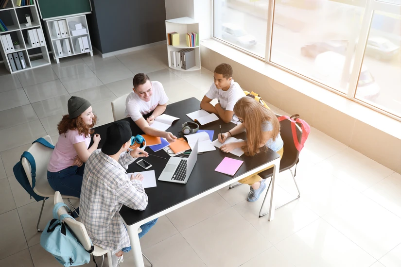 A student team collaborates on a group project