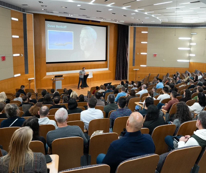 Adam Alter leading an alumni workshop