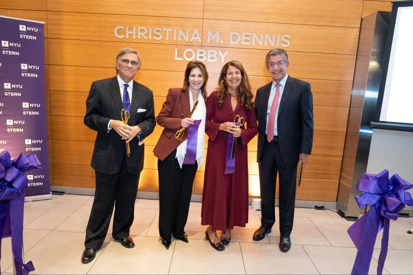 From left: Chair NYU Trustees Evan Chesler, NYU President Linda Mills, Christina Dennis (BS ‘80), NYU Stern Dean Anand Bharat